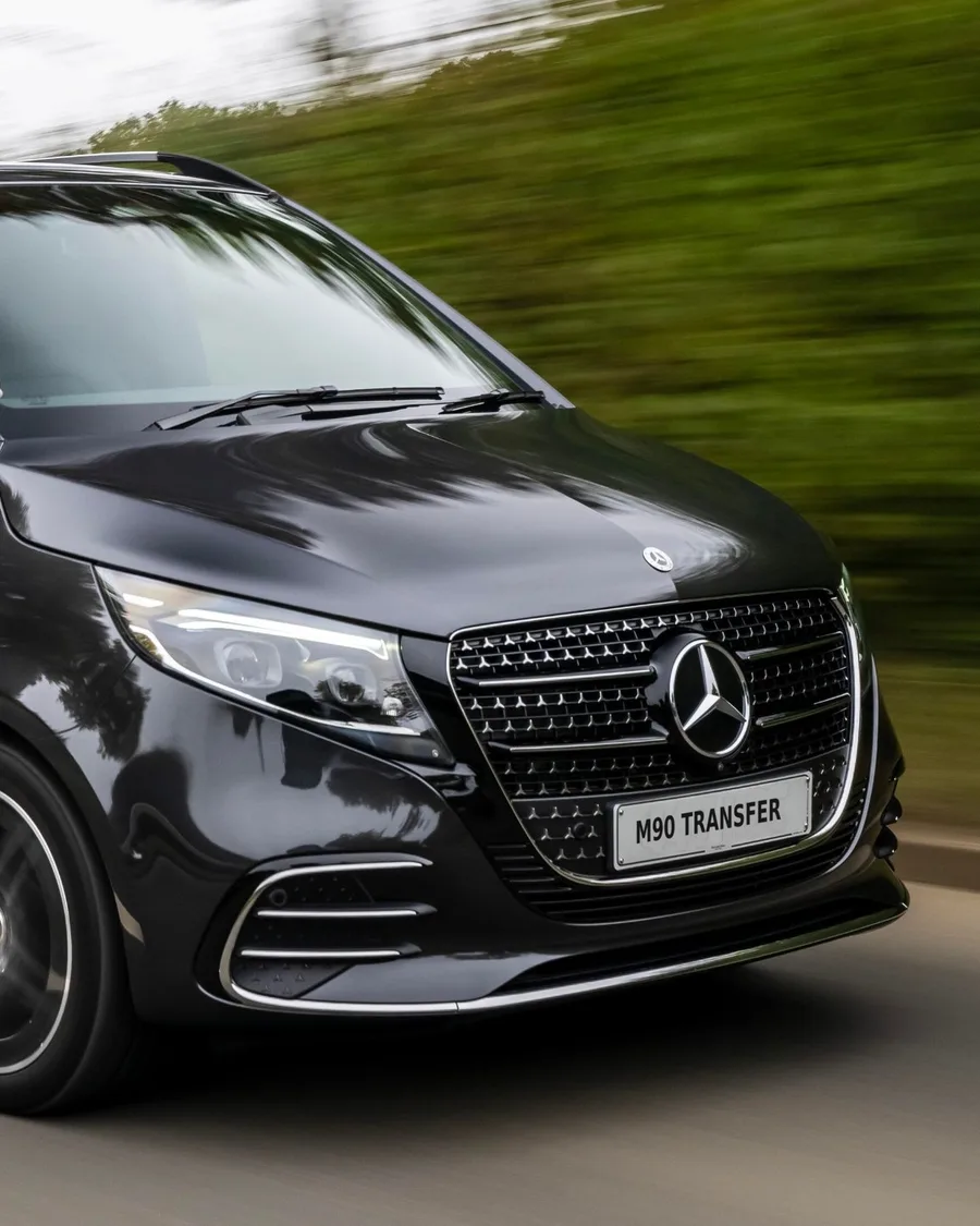 Black Mercedes-Benz V-Class executive people carrier, registration M90 Transfer